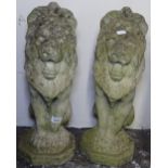 A pair of weathered concrete rampant lion statues, H50cm