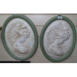 2 wall plaques with portrait decoration, height 42cm, and a porcelain framed wall mirror