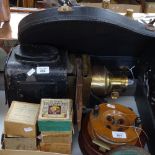 A brass-mounted Magic Lantern, and 6 boxes of lantern slides, including Arctic Expedition,