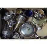 A box containing a silver plated coffee pot, a muffin dish, cruets etc