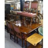 A mahogany dining table on baluster turned legs, together with a set of 4 oak and leather