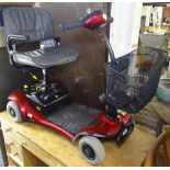 A Shoprider mobility scooter, complete with charger