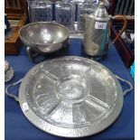 An Arts and Crafts hammered pewter bowl on stylised foot, a "Unity" pewter coffee pot, and