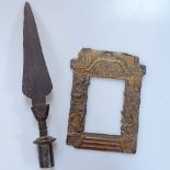 A Chinese embossed copper frame with dragon design, 26cm, and an Ethnic knife