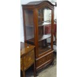 A hardwood arch-top display cabinet, with single glazed door, and drawers to the base, W75cm, H175cm