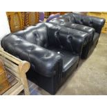 A pair of black leather button-back upholstered Chesterfield Club chairs