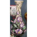 A Moorcroft tube-lined vase with floral design, height 23cm