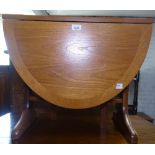 A small Parker Knoll drop leaf teak occasional table, W61cm, H50cm