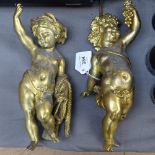 A pair of gilt-bronze cherubs, largest 5cm