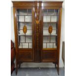 An Edwardian mahogany and marquetry decorated display cabinet, 2 glazed doors, and square tapered