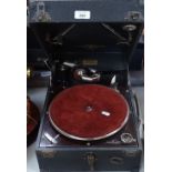 A Columbia portable gramophone, with spare needles