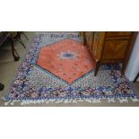 A red ground Moroccan Rabat rug, 230cm x 180cm