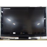 A Lowrey 30" flat screen television with remote