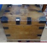 A 19th pine and steel-bound trunk, of small size, W55cm, H49cm