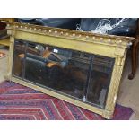 A Regency giltwood triple-mirror over-mantel, with split-turned reeded columns and ball