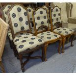 A set of 4 oak high-back and upholstered oak dining chairs, on claw and ball feet, and a pair of