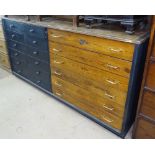 A large polished and painted pine haberdashery bank of 12 short and 6 long drawers, L200cm, D73cm,