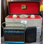 HMV portable radio, 26cm across, a Pye 1400 transistor radio and another
