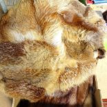Fur gilets, a stole, and a fur coat