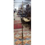 A Victorian brass pole screen (no panel)