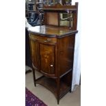 A Victorian rosewood bow-front music cabinet, with raised mirrored back, drawer and cupboards under,