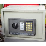 An electronic digital safe, length 34cm