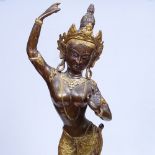 A gilded bronze figure of a South East Asian dancer, 50cm