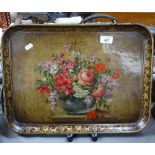 A lacquered and gilded tea tray with painted vase of flowers, length 45cm
