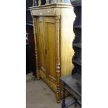 An Antique Continental pine larder cupboard, with fitted shelves, and 2 panelled doors and drawer to