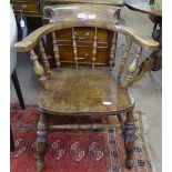 A Victorian elm spindle-back Captain's armchair