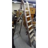 A pair of Vintage pine step ladders