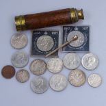 A telescope, a silver dollar, commemorative coins etc