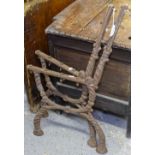 A pair of Victorian iron bench ends