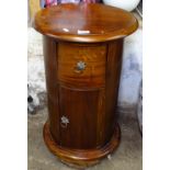 A hardwood barrel-design bedside cupboard/lamp table, with drawer