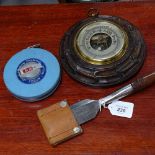 Buck Bros chisel with rosewood handle, a barometer, and a Rabone/Chesterman 10 metre tape