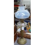 A Victorian brass oil lamp with Vaseline glass shade