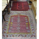 A small red ground Turkish rug, and a prayer rug (2)