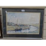 Peter McLaughlin, watercolour, beached boats, signed, 11" x 17", framed, together with a similar