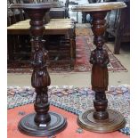 A pair of French oak wine tables with figural supports, H71cm