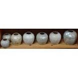 A shelf of Chinese ginger jars