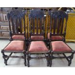 A set of 6 Liberty Lochleven Arts and Crafts oak dining chairs, Liberty enamel labels to underside