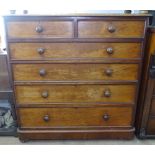 A large Victorian mahogany chest of 2 short and 4 long drawers, with turned wood handles, W129cm,