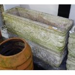 A pair of weathered embossed concrete rectangular planters, 71cm