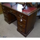 A Victorian mahogany knee-hole writing desk, with fitted drawers, W130cm, H81cm