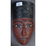 A carved and painted wooden Egyptian mask, 26cm