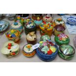A collection of Japanese Marutomoware moulded and painted pottery honey pots