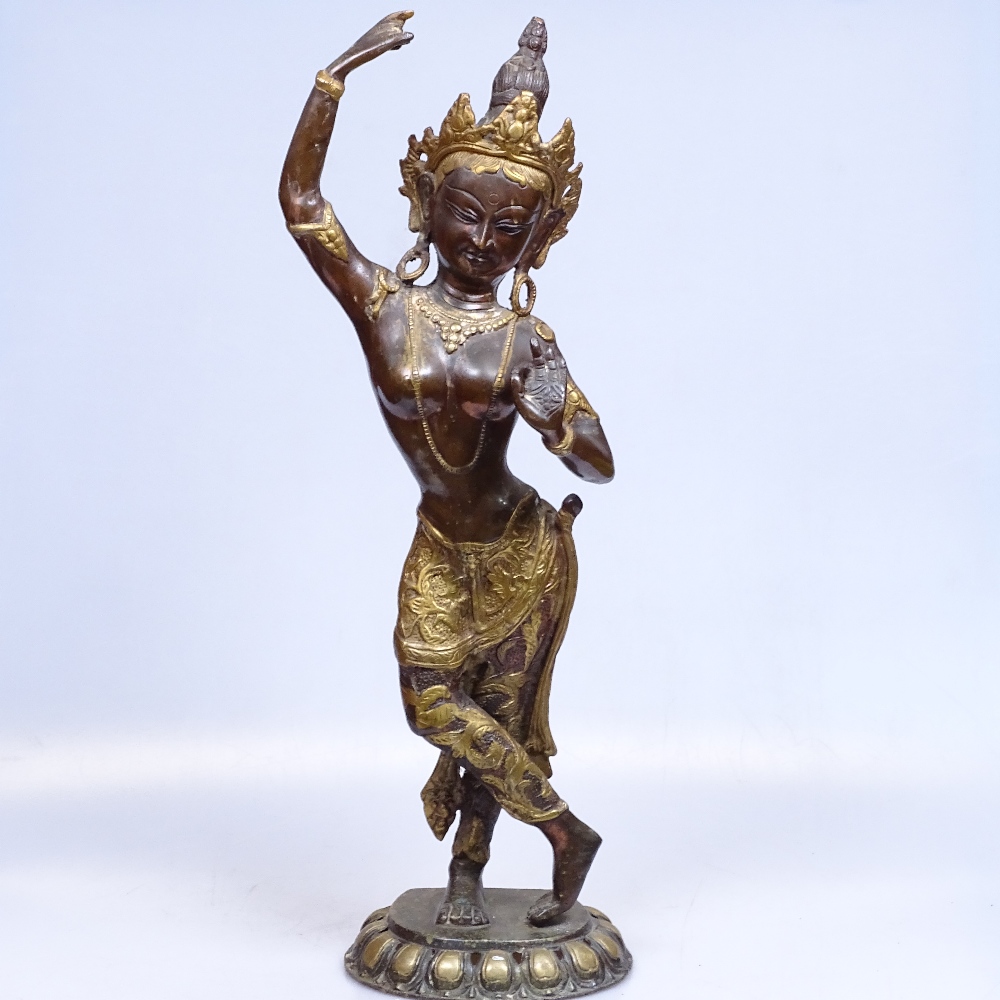 A gilded bronze figure of a South East Asian dancer, 50cm - Image 2 of 2