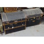 A pair of 19th century leather-bound dome-top travelling trunks