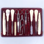 Ivory-handled cut-throat razors, manicure items etc in fitted tray