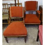 An Edwardian upholstered parlour armchair, and a matching nursing chair